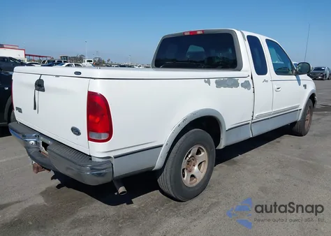 1999 Ford F-150 Lariat/Xl/Xlt из США, поврежденный, VIN 1FTRX17L0XKB52478